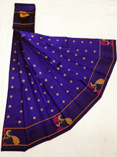 Peckok border brocade paithani saree.